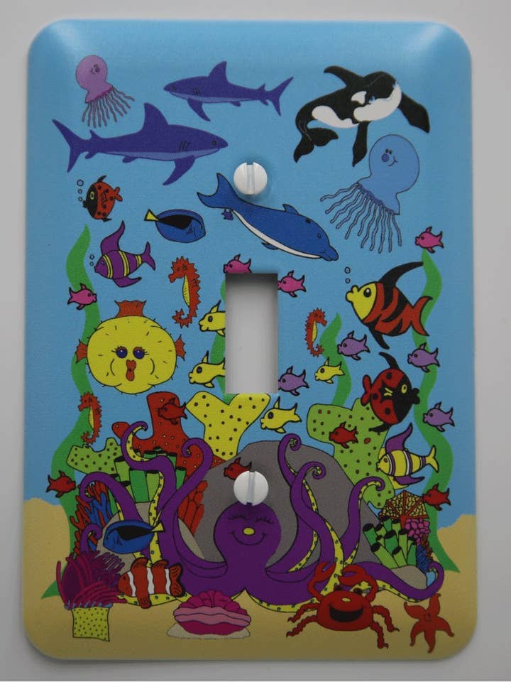 Placas de interruptor de luz submarina con animales marinos en esta decoración de pared para guardería infantil submarina. para venta al por mayor de Presto Chango Decor