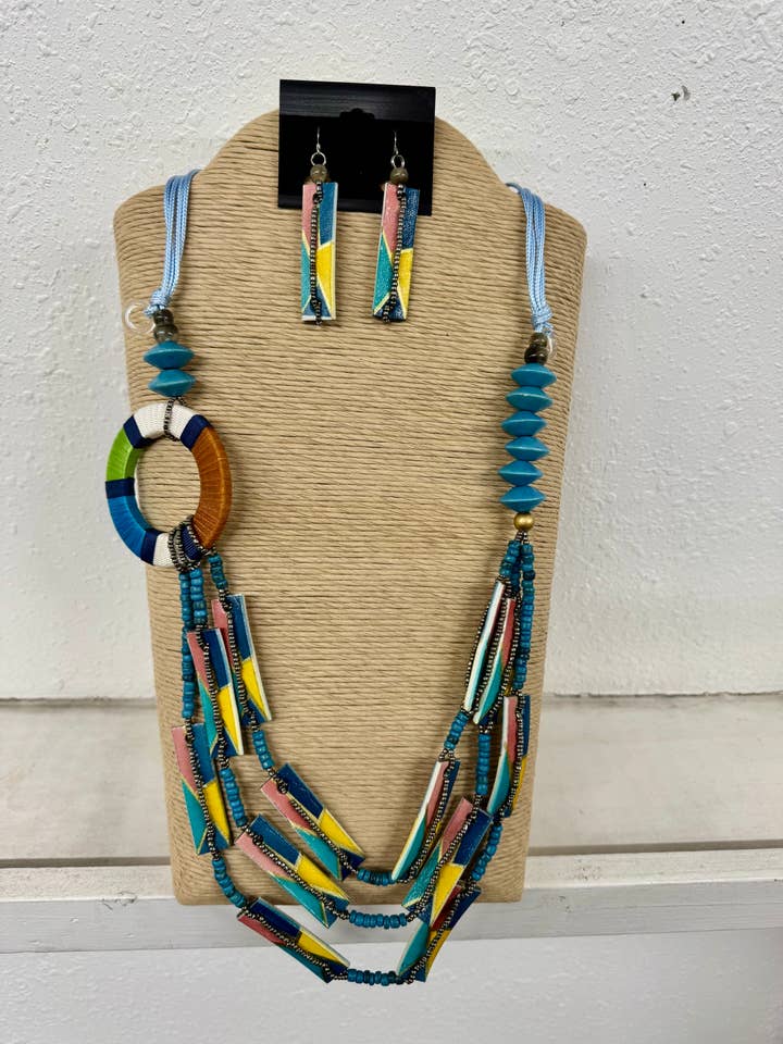 4 STRANDS LIGHT BLUE WAX CORD WITH MULTI BLUE ROUND RING WIT for wholesale by International Duru's