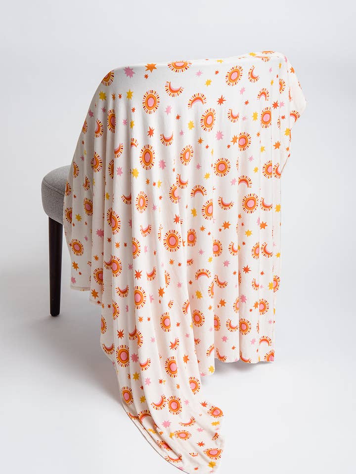 Sol og måne Swaddle for engroshandel hos Pax & Lucy