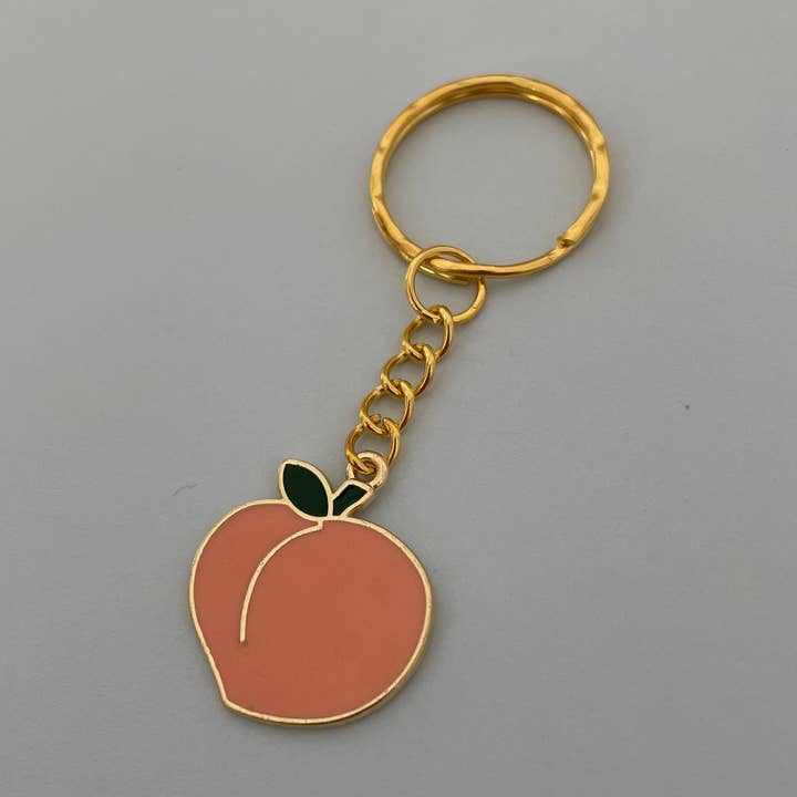 Llavero de esmalte con diseño de durazno unisex para venta al por mayor de Roshni Desai & Things