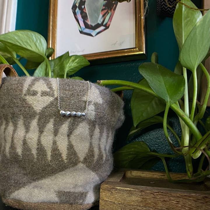 Ripples in the water minimalist family necklace for wholesale by Nevermore Fine Jewelry