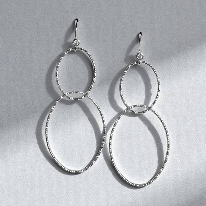 INFINITY earrings made of 925 silver with zirconia for wholesale by Grethe Winter