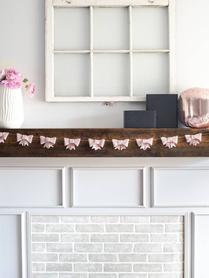 Bow Garland (Pink) for wholesale by Nivas