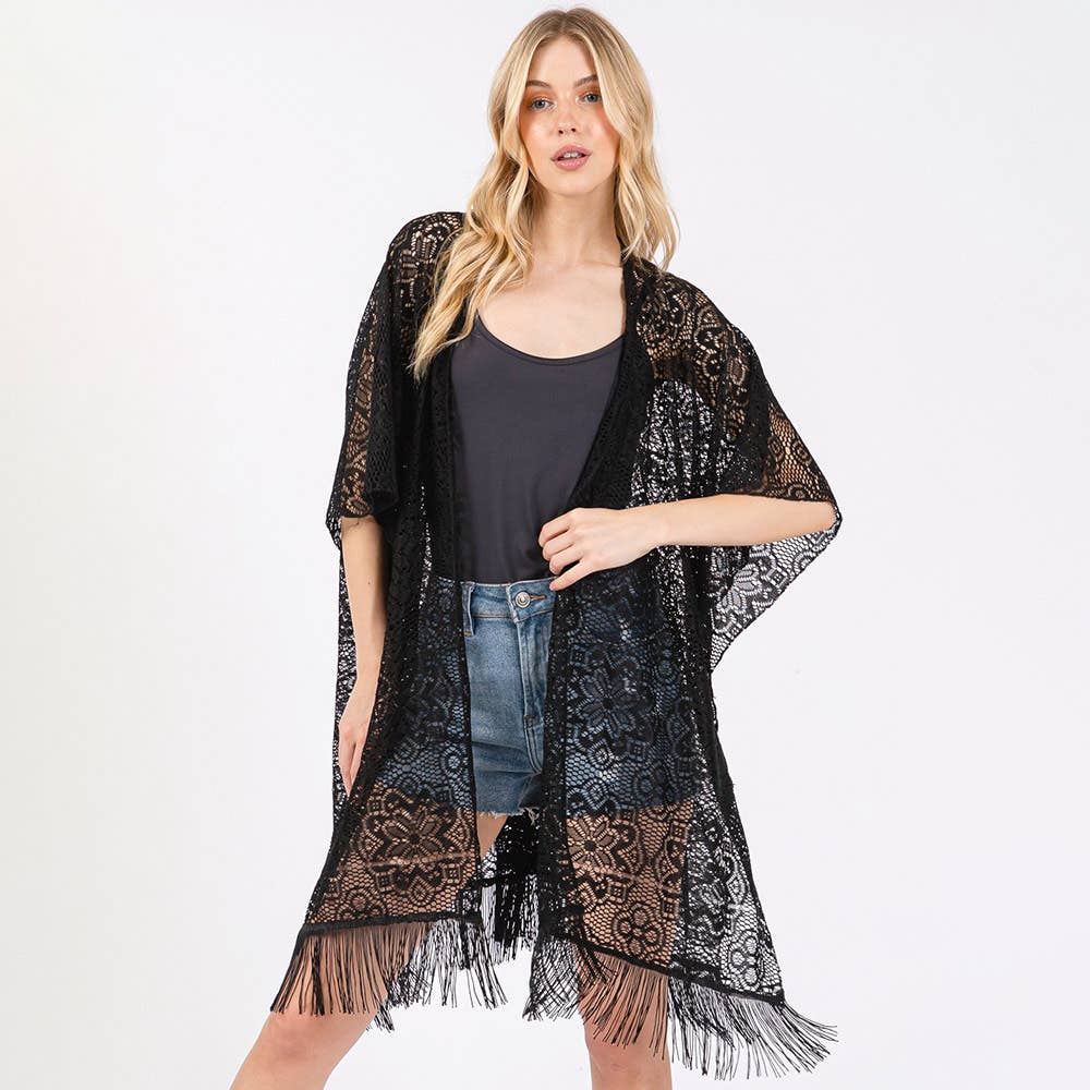 Sensibling Corp. – wholesale Swim cover-up – Women’s – Flower Pattern Crochet Lace Tassel Cover Up Poncho1