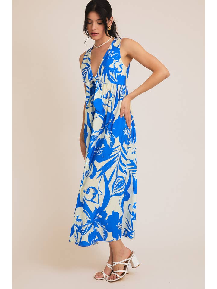 V-NECK FRONT TIE SLEEVELESS BUTTON UP TROPICAL PRINT DRESS for wholesale on Faire