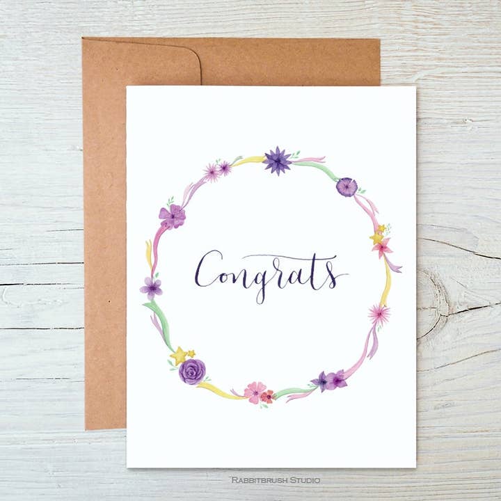 Biglietto di congratulazioni con ghirlanda di nastro per la vendita all'ingrosso da parte di Rabbitbrush Studio