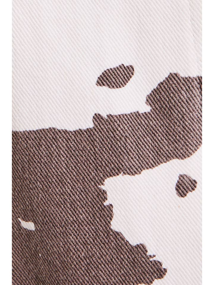 WHITE BROWN ANIMAL COW PRINT SHORTS for wholesale on Faire