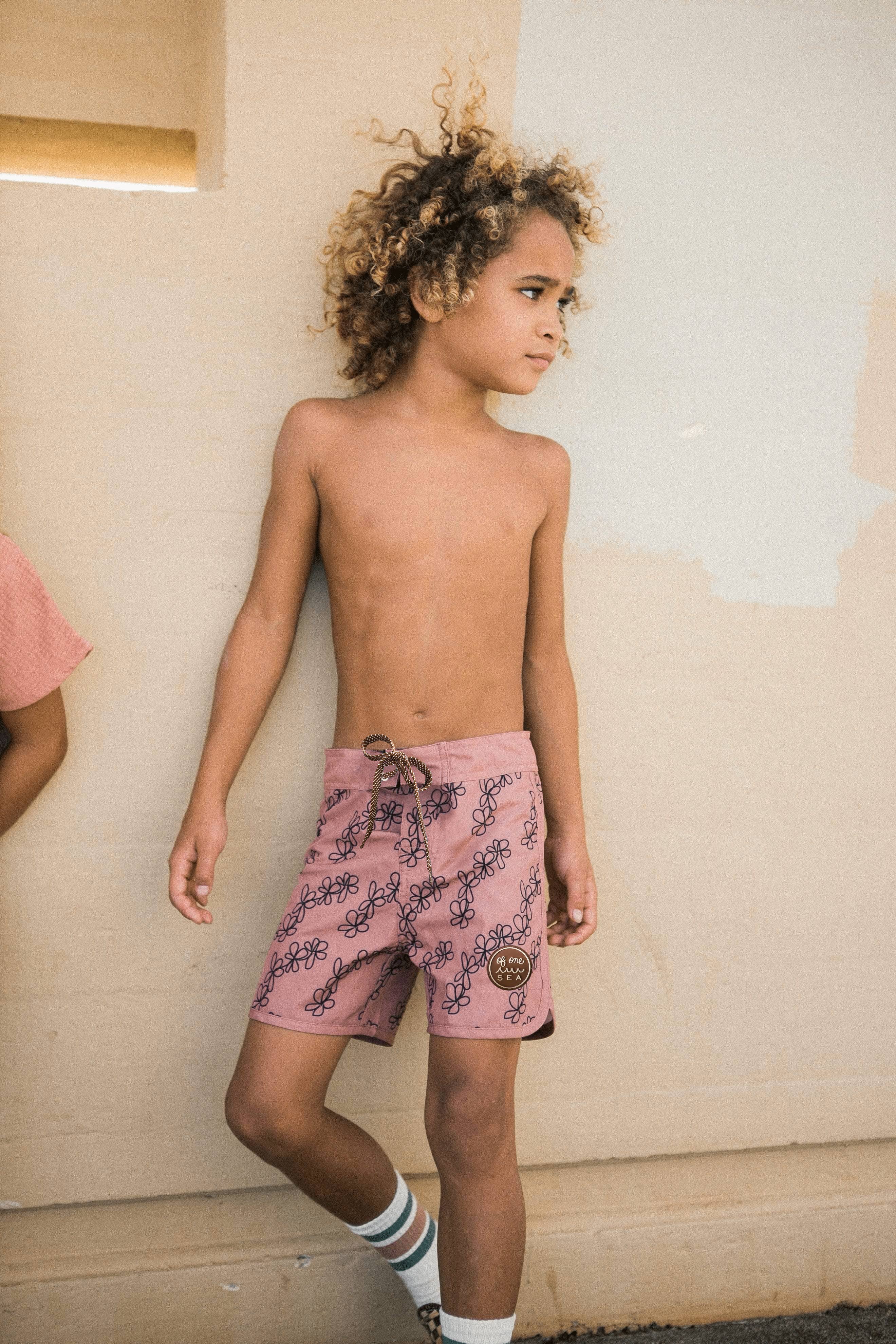 Kid’s Retro Boardshorts in Mauve Lei for wholesale on Faire