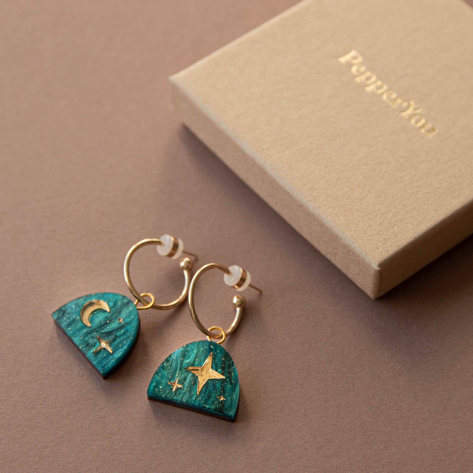 Moon Rising Arc Hoops in Teal Marble & Gold for wholesale on Faire1