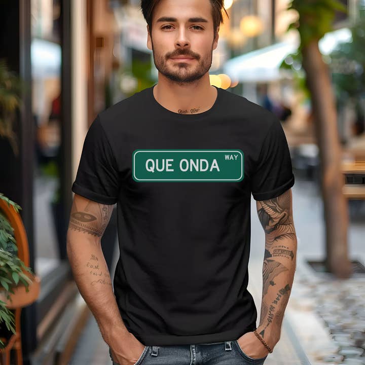 Qué Onda Street Sign Graphic Tee - Fun & Chill Latinx Shirt | Camiseta Relajada y Divertida for wholesale by Bloom Designs