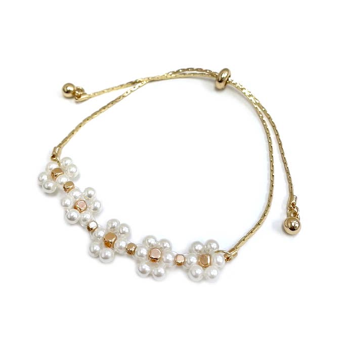 StarryNYC - Vente Bracelets à breloques/pendentifs - Bracelet à nouer avec chaîne cobra en forme de couronne de fleurs en perles3