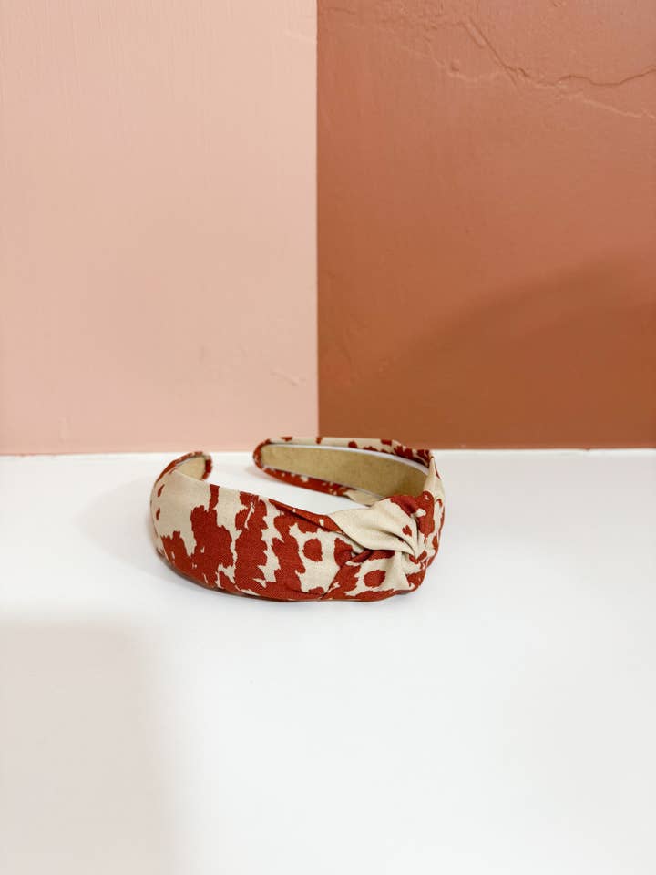 Tan & Rust Cow Print Top Knot Headband for wholesale by Little Sunshines Bow & Co