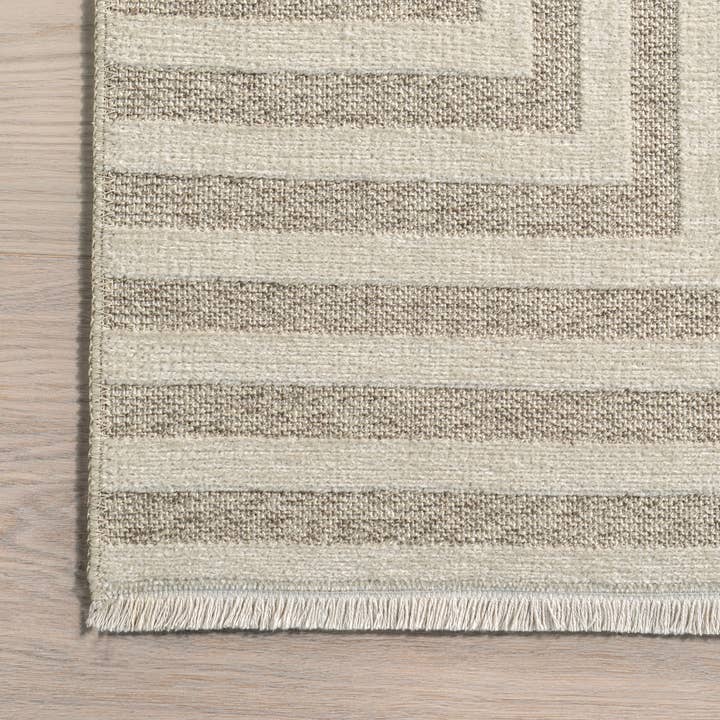 Cream Nicolai Graphic Fringed Reversible Machine Washable Area Rug for wholesale on Faire