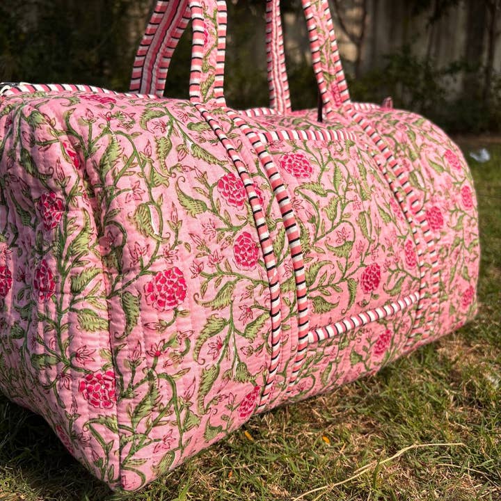 pink floral quilted duffle bag block printed for wholesale by The Cotton County