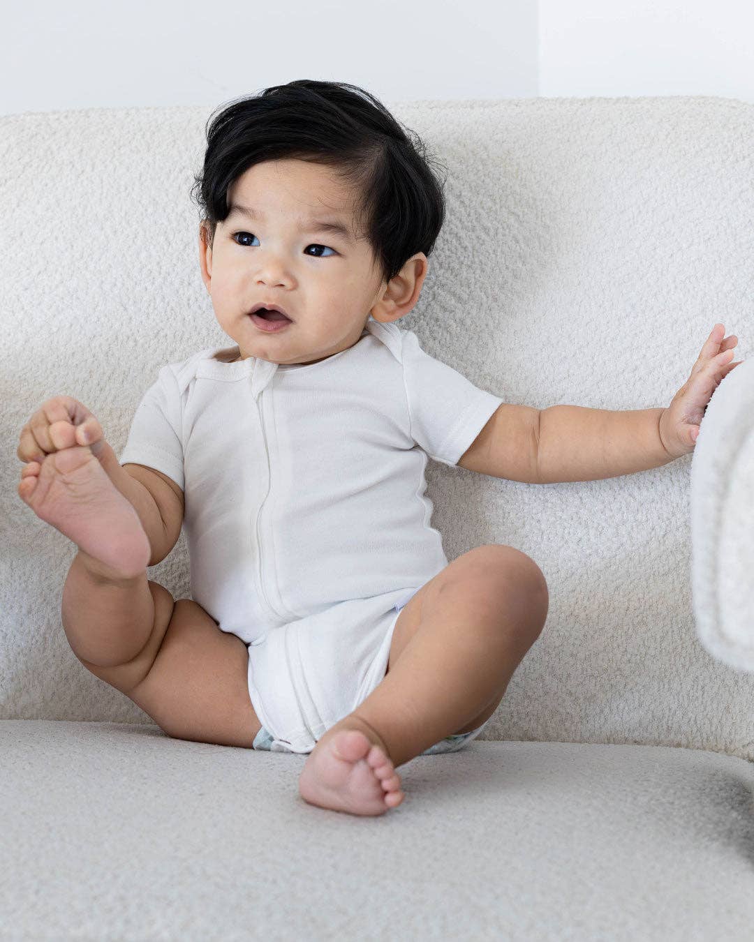 Pearl Zipper Bodysuit in Pearl, Newborn for wholesale on Faire0