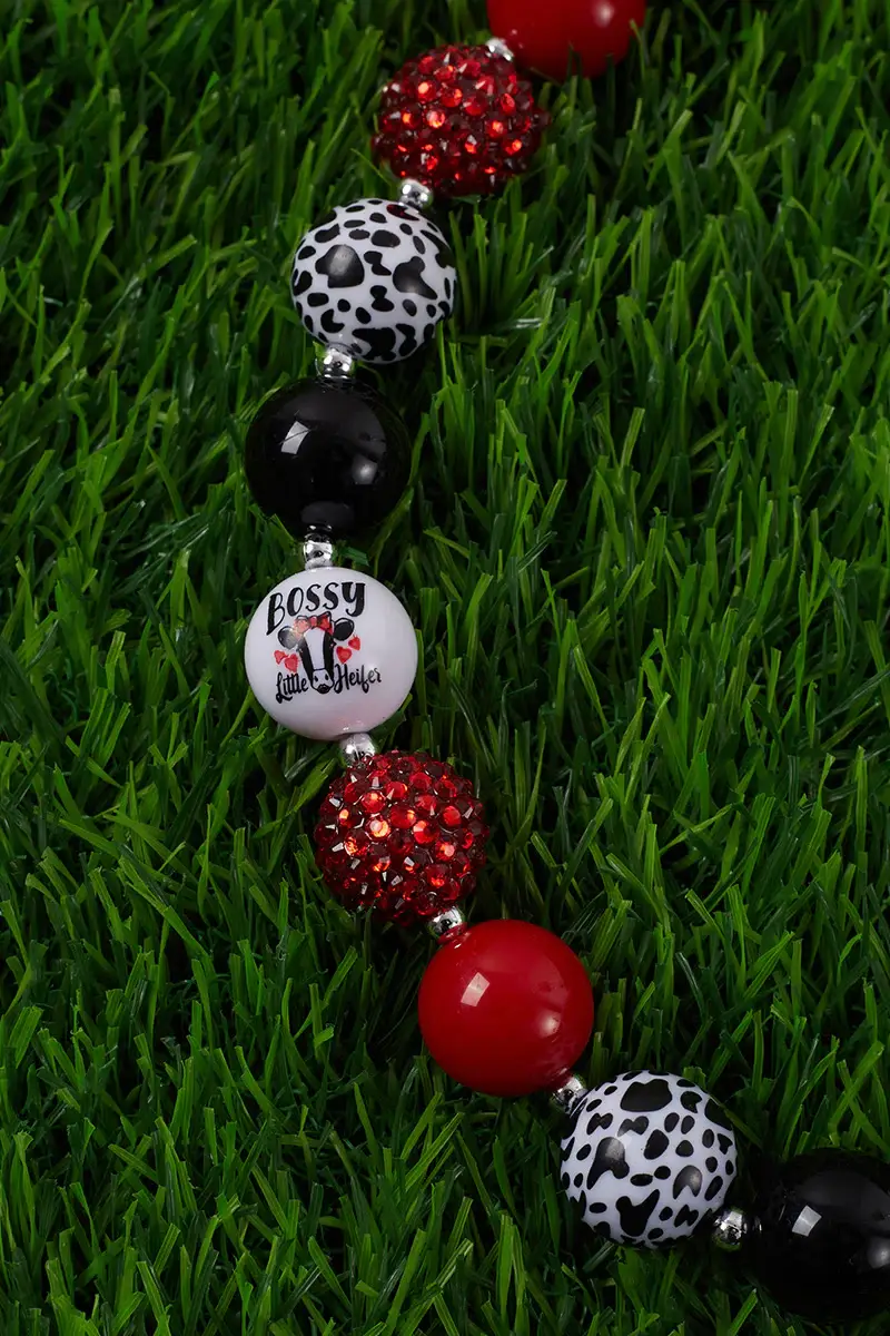 Kids Charm Online - Vente Collier – enfant - COLLIER DE PERLES EN GOMME À BULLES ROUGE ET POINTS DE VACHE. 3 PIÈCES/12,00 $1