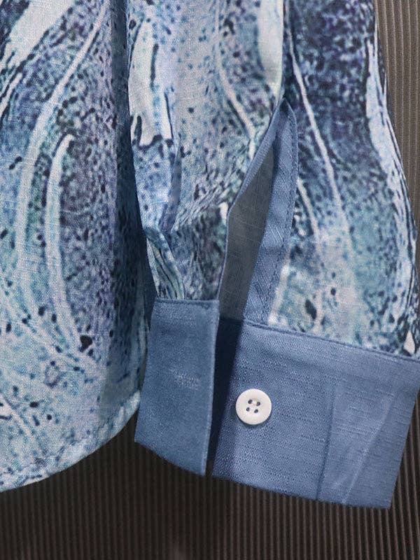 Plush Looks – Großhandel Hemd mit Button-down-Kragen – Damen – Stylische, asymmetrische, langärmlige Blusentops mit Blumendruck und Revers3