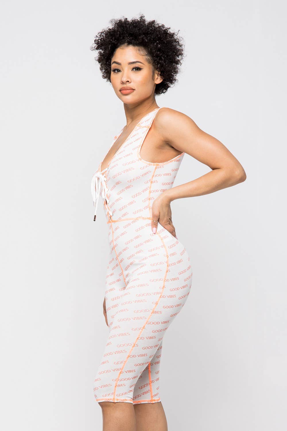 WHITE GOOD VIBES LACE-UP ROMPER for wholesale on Faire1