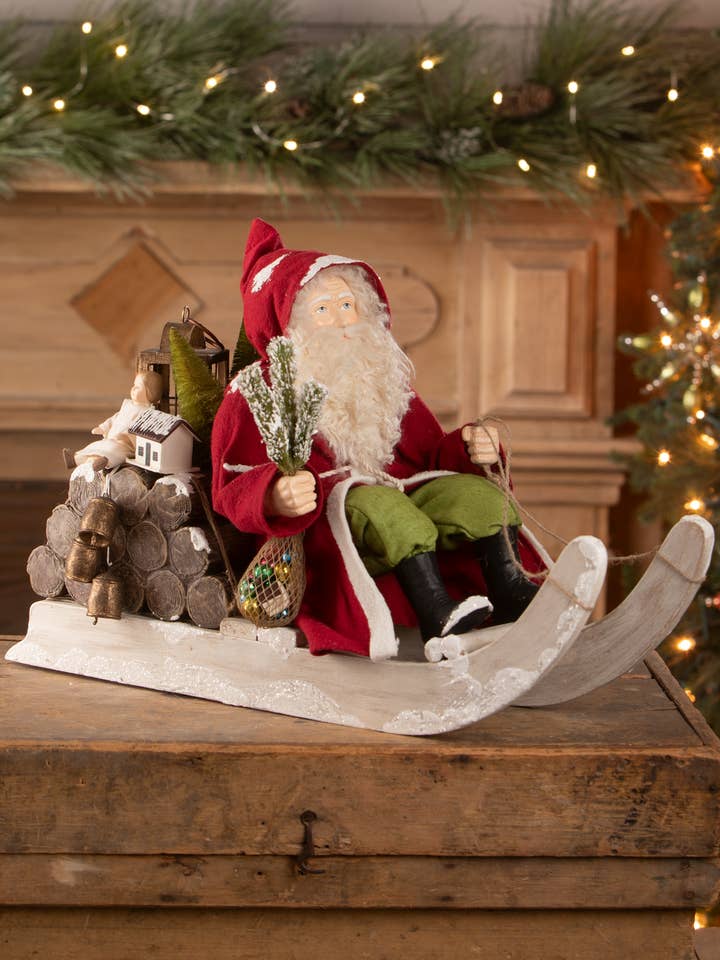 Santa on Log Sled for wholesale by Bethany Lowe Designs