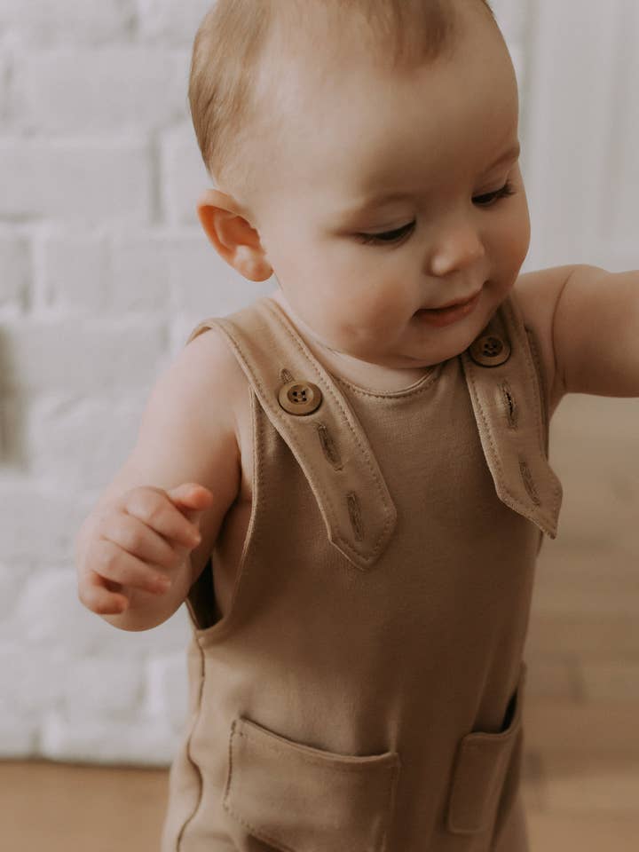 Adjustable sand-colored overalls in bamboo for wholesale by Kim & Joe