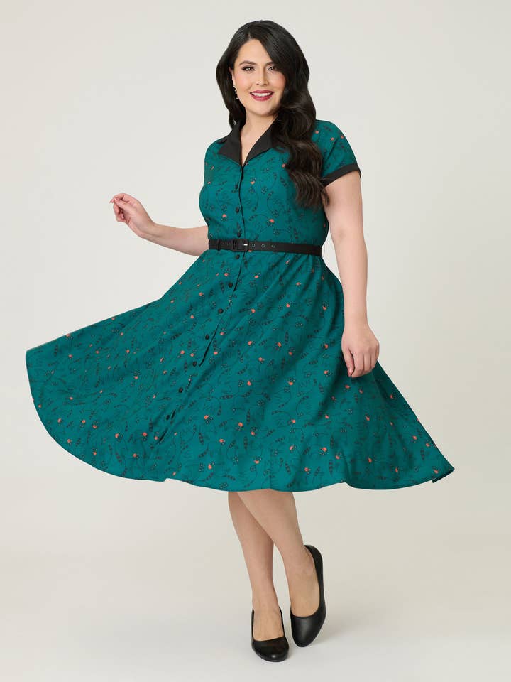Unik Vintage Plus Size Teal Raccoon Print Alexis Swingklänning för wholesale av Unique Vintage