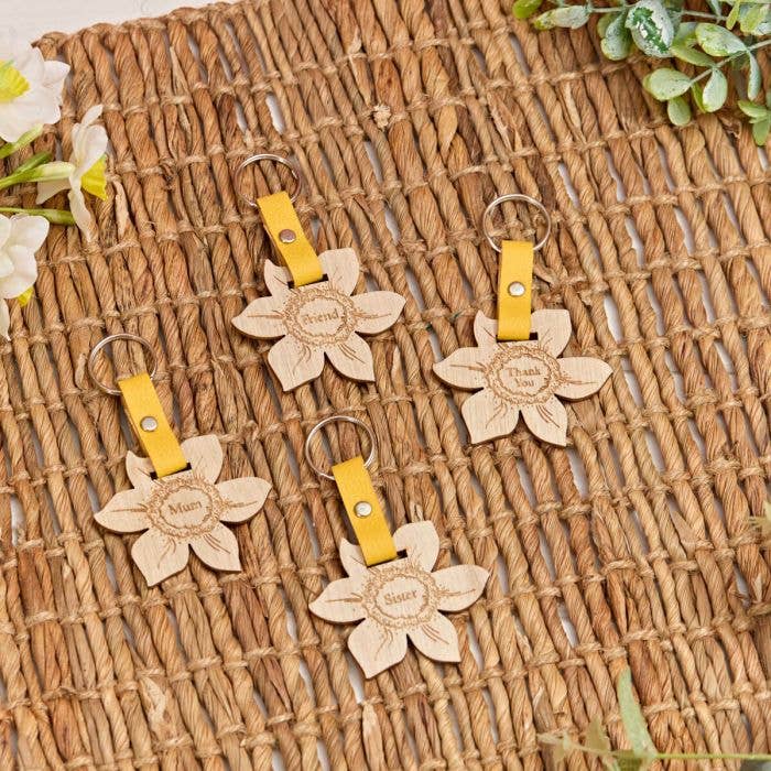 Daffodil Shaped Wood Keyring 4 Asstd Sayings for wholesale by Langs