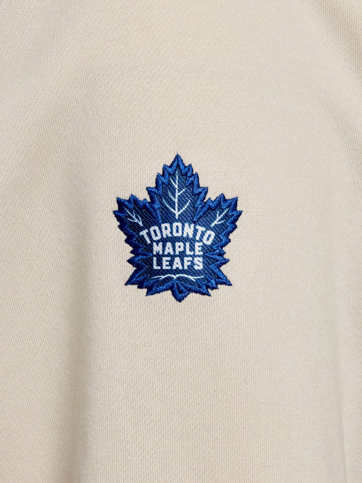 Cream Toronto Maple Leafs Zip-Up Hoodie for wholesale on Faire7