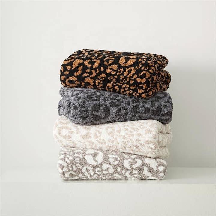 Thomas and Lee Company - Vendita all'ingrosso Plaid - Coperta da tiro leopardata Luxe - Leopardo bianco e nero