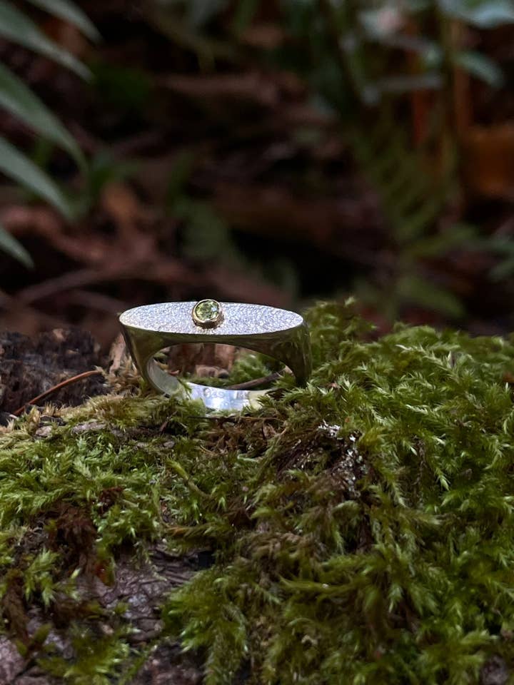 Silver and 14k gold peridot ring for wholesale by Nordic Pine