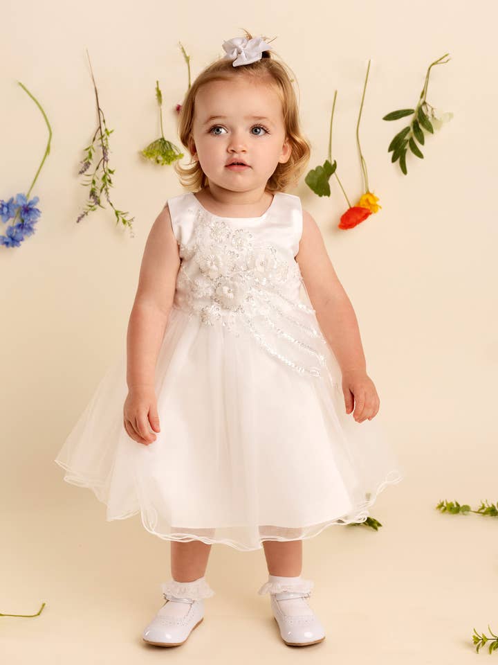 Nikki Baby Girls Ivory Dress L2655A for wholesale by Sevva Ltd.