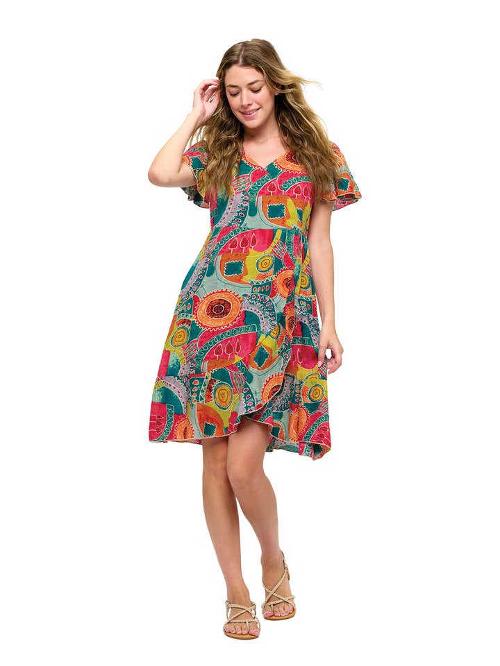 Retro Inspired Whimsical Print Overlap Dress for wholesale by Yak & Yeti