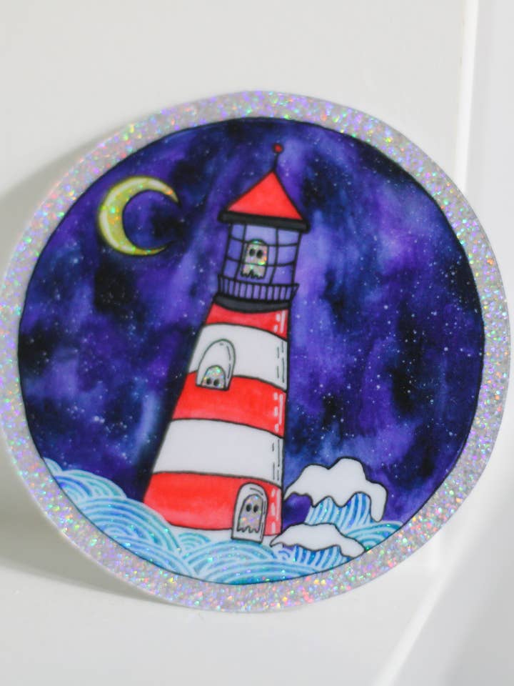 Spooky Glitter Ghost Lighthouse Sticker for wholesale by Scribbles and Doodlez