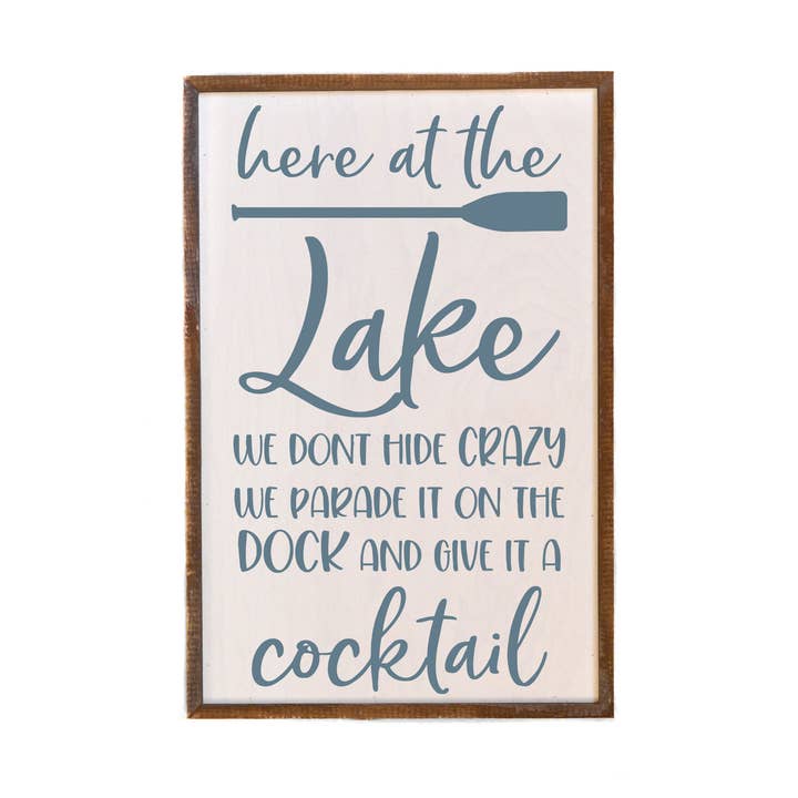 12x18 Here At The Lake We Don't Hide Crazy Wood Lake Signs for wholesale by Driftless Studios