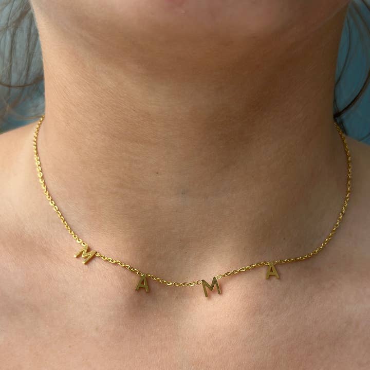 Mama Necklace "Gold" and other Purchase Wholesale how much is a bag. Free Returns & Net 60 Terms on Faire trending on Faire.