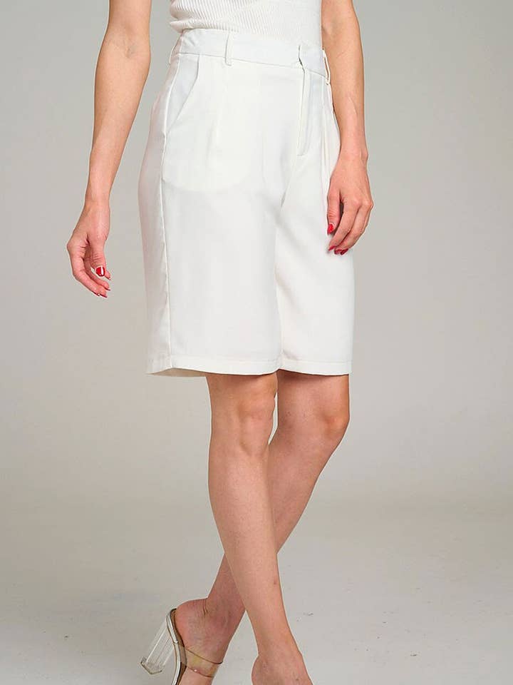 BERMUDA AVEC POCHES À FERMETURE PAR BOUTON pour la vente par ROUSSEAU