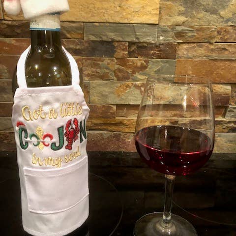 Wine Bottle Apron- Cajun Soul Christmas for wholesale by All Aboard Party Headquarters