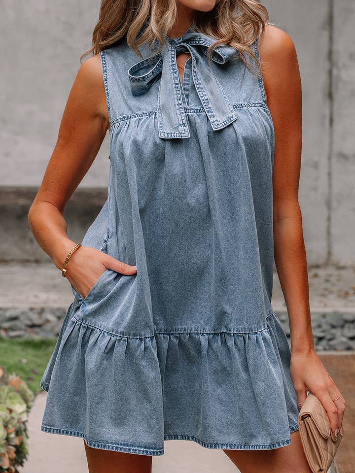 Chambray Bow Neck Sleeveless Ruffle Dress and other Purchase Wholesale chambray dress. Free Returns & Net 60 Terms on Faire trending on Faire.