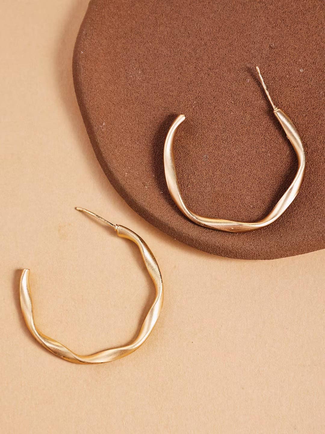 Revelari - Wholesale Hoop Earrings - Twisted Minimalist Gold Hoop Earrings0