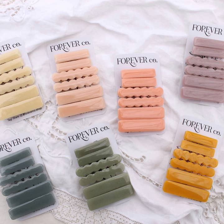 Haarspeldjes in pastelkleurige hars: roze, lavendel, parelmoer, paaslente voor wholesale door Forever Company