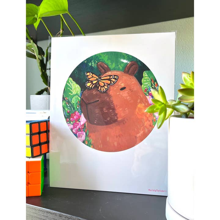 Stampa artistica 8x10 Capibara con una farfalla per la vendita all'ingrosso da parte di Moldy Tofu Art