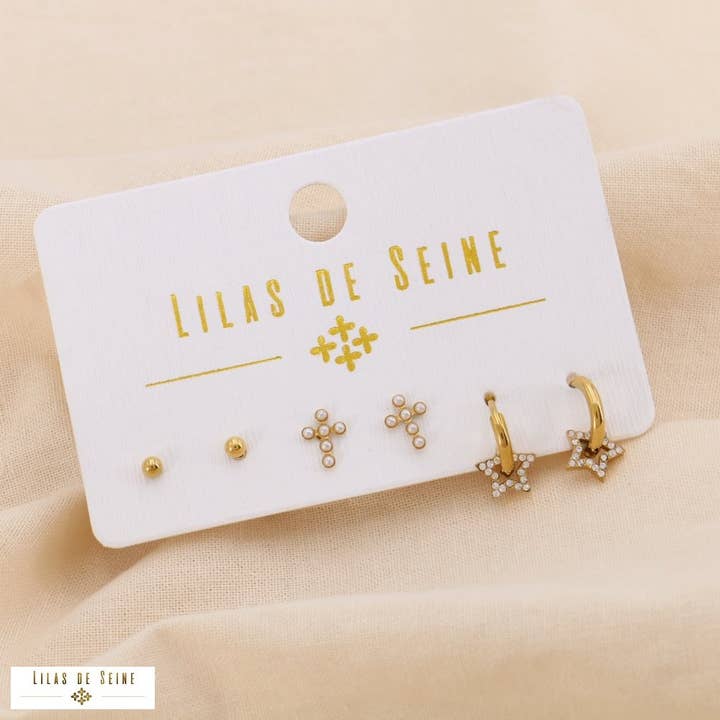 3 paia di orecchini a croce stella acciaio 0324209 per la vendita all'ingrosso da parte di Lilas de Seine