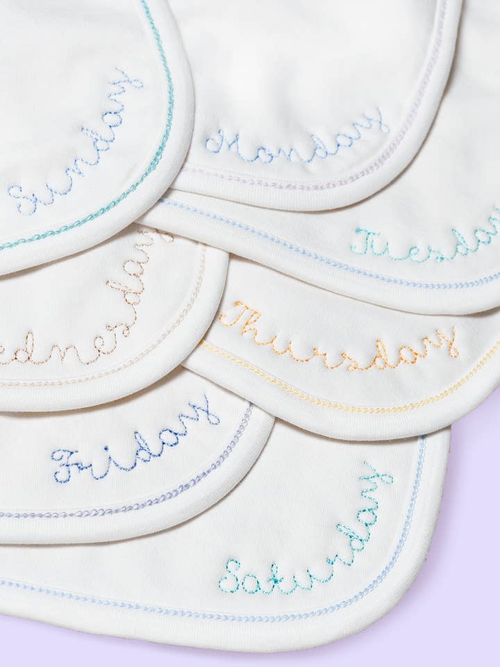 Days of the Week Bib for wholesale by PiP PEA POP