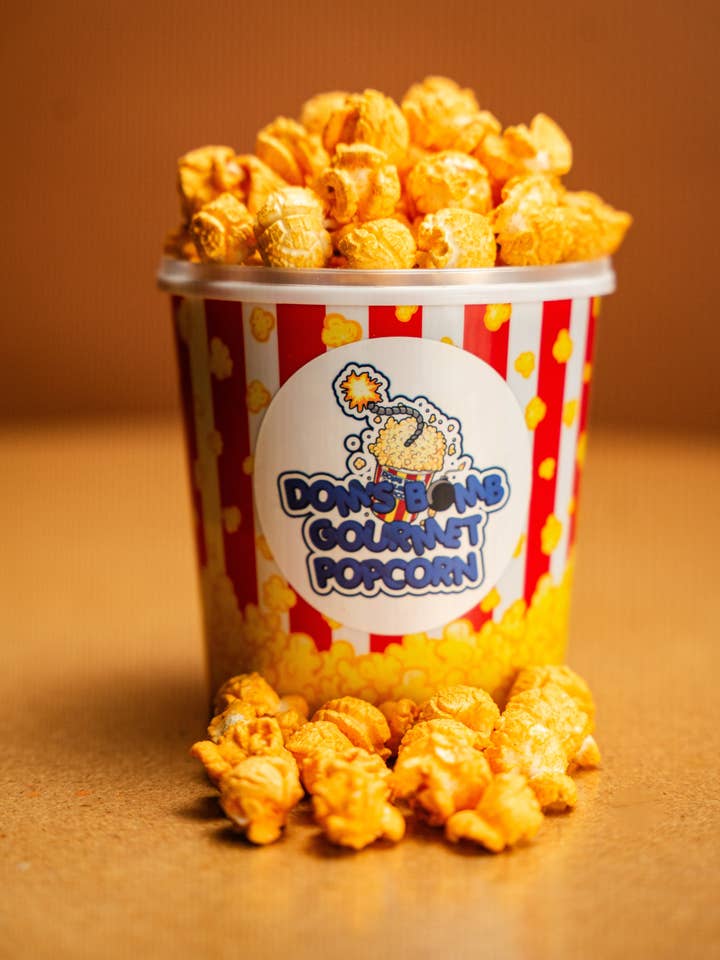 Dynamite for wholesale by Dom's Bomb Gourmet Popcorn LLC