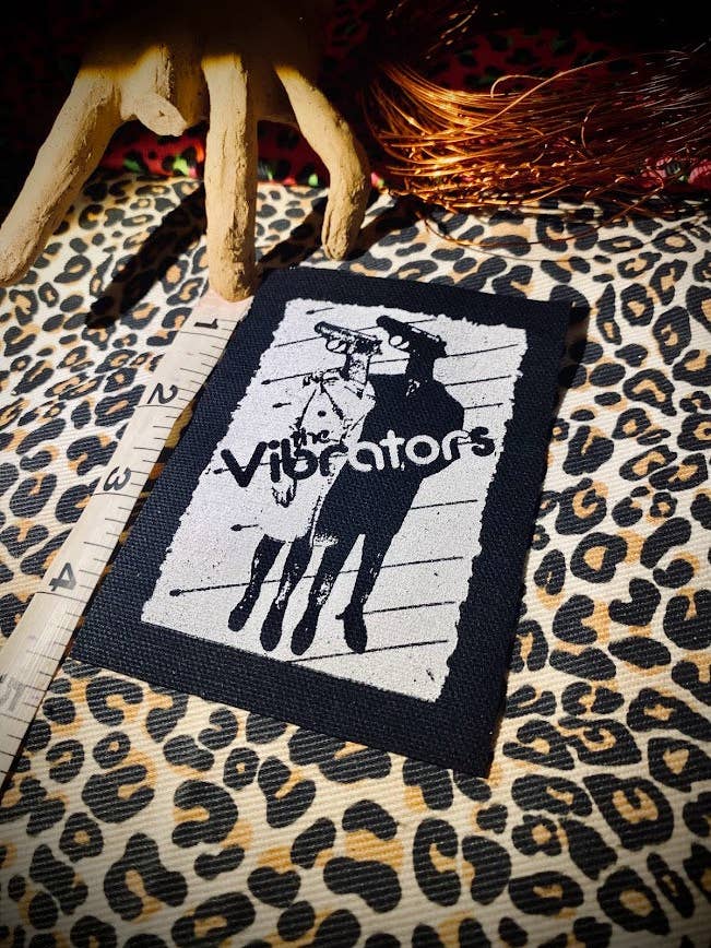 The Vibrators sy på märke. för wholesale av Three Raccoons