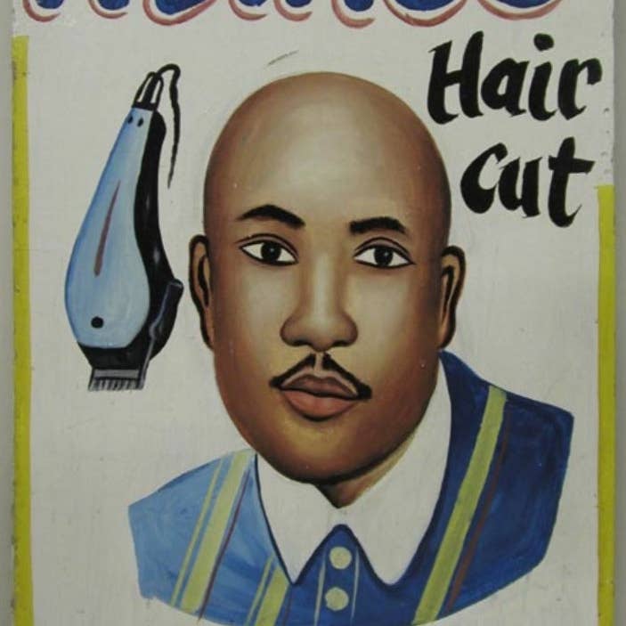 Panneau de style sandwich pour salon de coiffure pour la vente par The Niger Bend