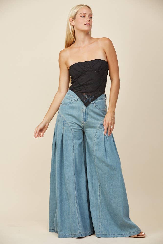Mid Denim PANTALONES VAQUEROS ANCHOS PALAZZO FLUIDOS DE TIRO ALTO de venta al por mayor en Faire