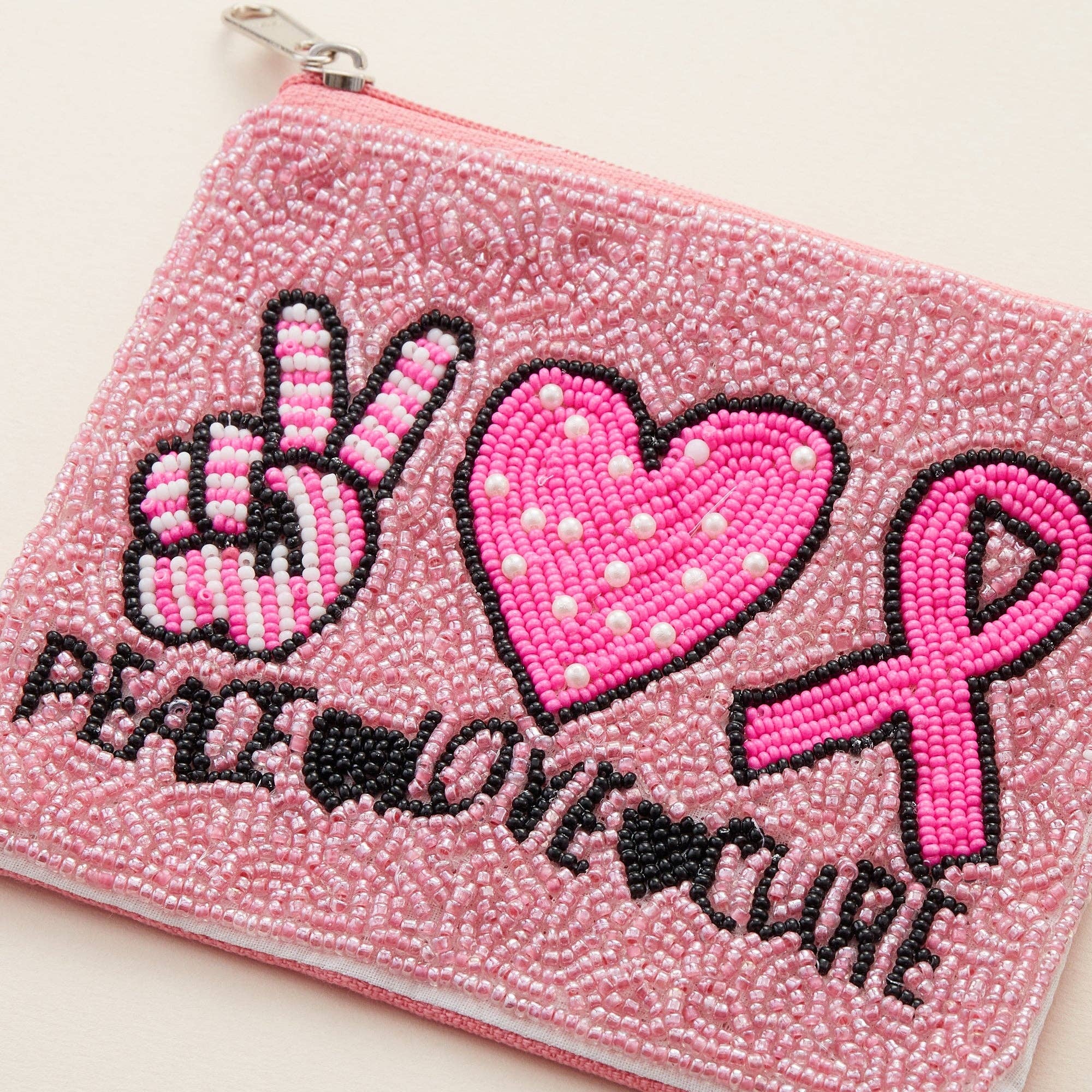 Multi PEACE LOVE CURE Pink Ribbon Seed Bead Canvas Pouch for wholesale on Faire1
