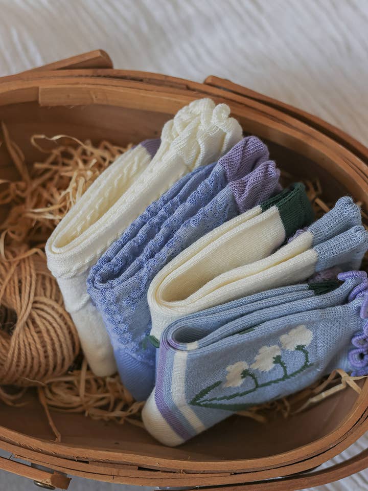 Multicolored πΈ Pack of 4 Pairs of Children's Socks with Floral Charm for wholesale on Faire6