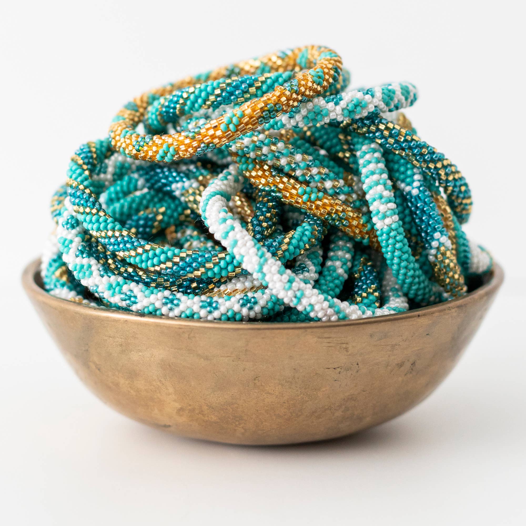 Aid Through Trade - Wholesale Jewelry Set - 💎 Roll-On® Jewelry -  Aquamarine - Set of 12 Bracelets 1