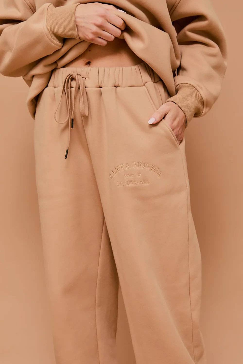 Beige "Santa Monica California" Embossed Graphic Elastic Waist Drawstring Joggers for wholesale on Faire1